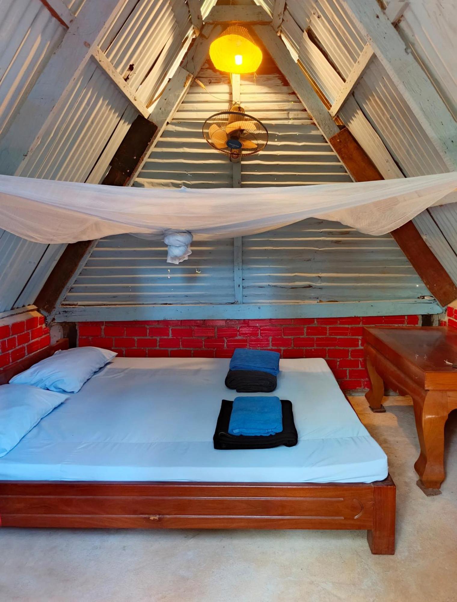 Banlung Ratanakiri Homestay & Jungle Trek חדר תמונה